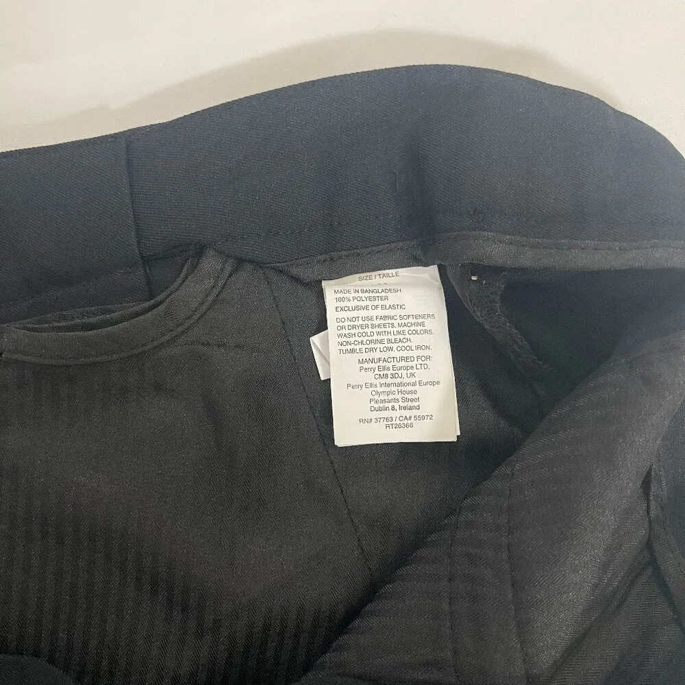 PGATOUR. Black golf shorts size 44. Made in Bangladesh. 100% Polyester.